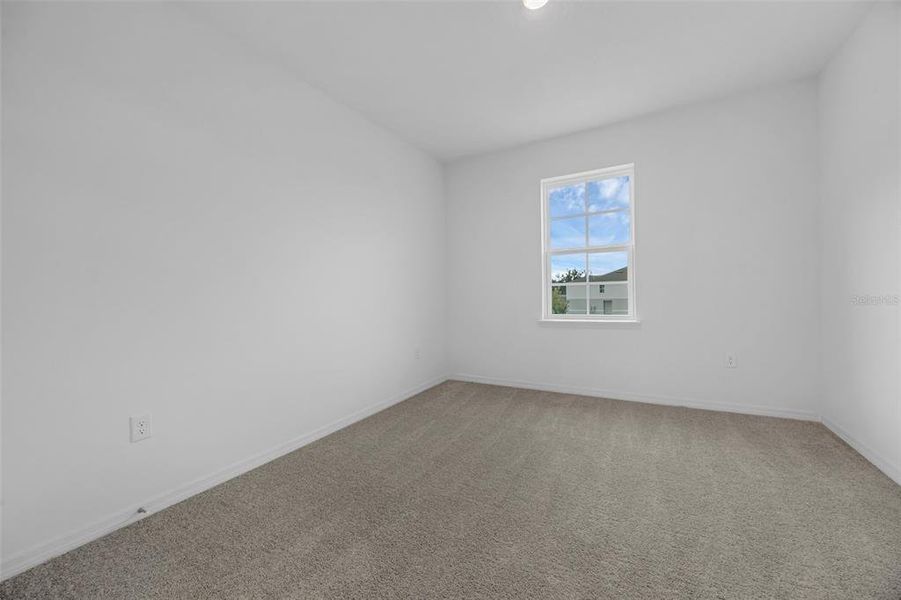 Spacious, unfurnished interior of a new home in Delaney Reserve, Deland (Image 21).