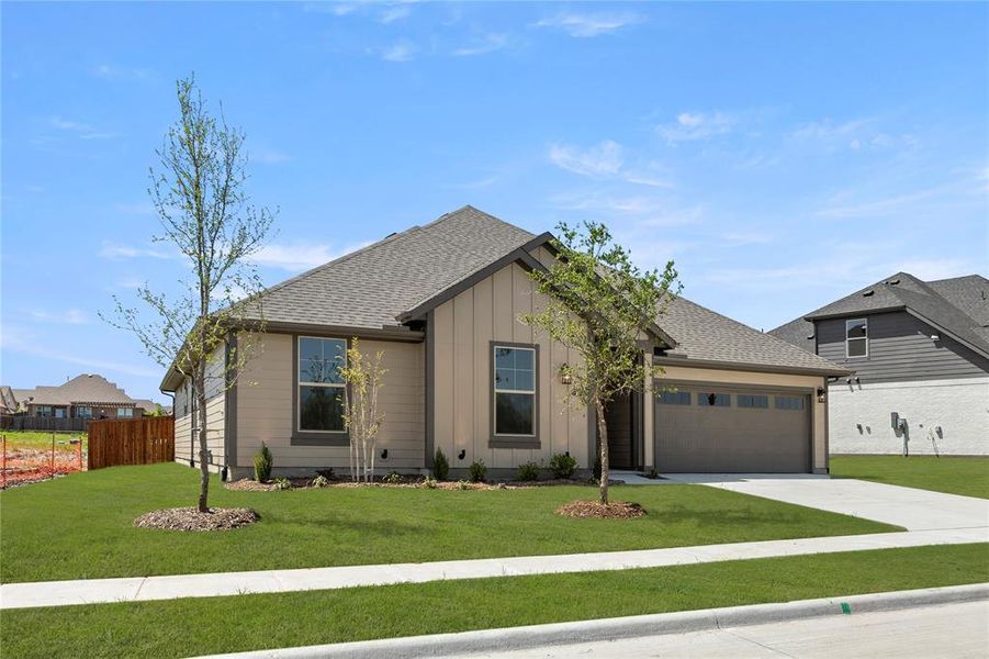 Front exterior of a new home in Somerset Park, Rockwall, TX, highlighting curb appeal (Image 18).
