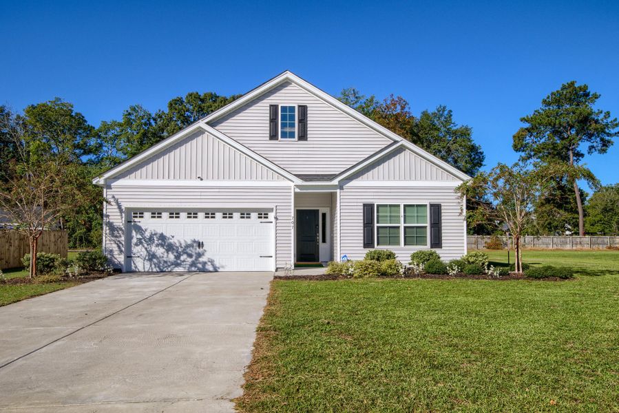 Front exterior of a new home in , Bonneau, SC, highlighting curb appeal (Image 23).