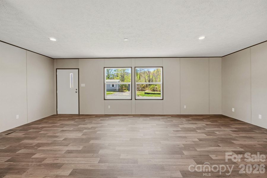 Spacious, unfurnished interior of a new home in , Old Fort (Image 10).