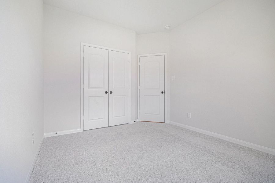 Spacious, unfurnished interior of a new home in Rose Hill Estates, Willis (Image 29). Spacious, unfurnished interior of a new home in Rose Hill Estates, Willis (Image 29).