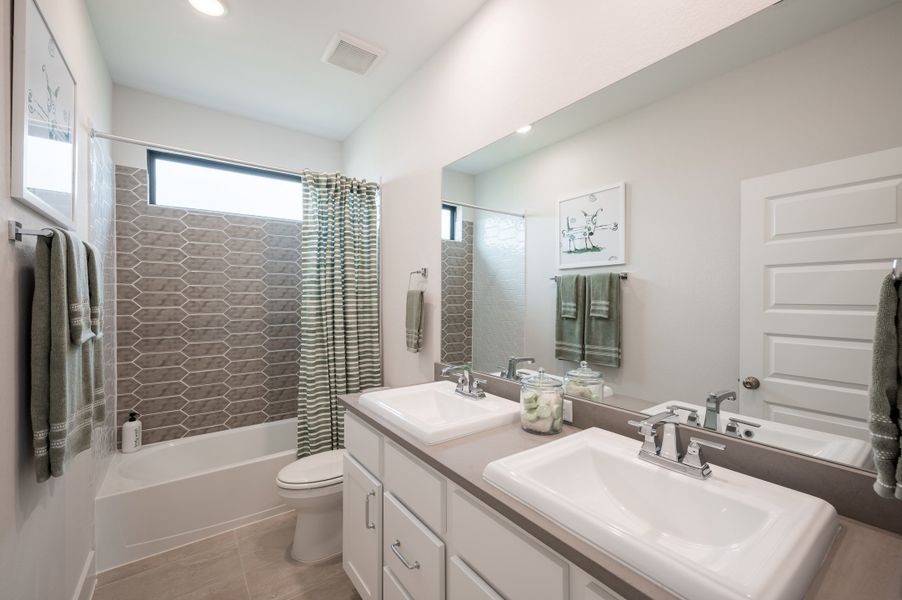 Representative furnished interior of a home built from the Goldeneye by Tri Pointe Homes in Jubilee 50′, Hockley (Image 8).