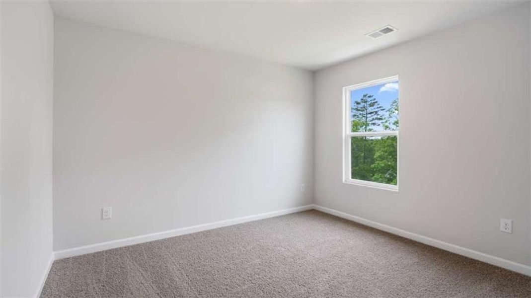Spacious, unfurnished interior of a new home in Brooks Station, Dacula (Image 26).