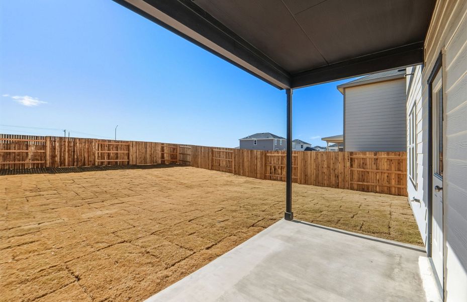 Exterior details and patio area of a home in Sunfield, Buda (Image 25).