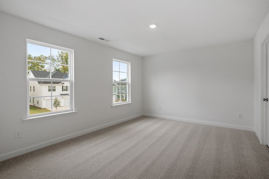 Spacious, unfurnished interior of a new home in Georgias Landing, Raleigh (Image 38).