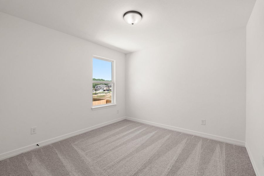 Your secondary bedroom features plush carpet, fresh paint, closet, and a large window that lets in plenty of natural lighting. Your secondary bedroom features plush carpet, fresh paint, closet, and a large window that lets in plenty of natural lighting.
