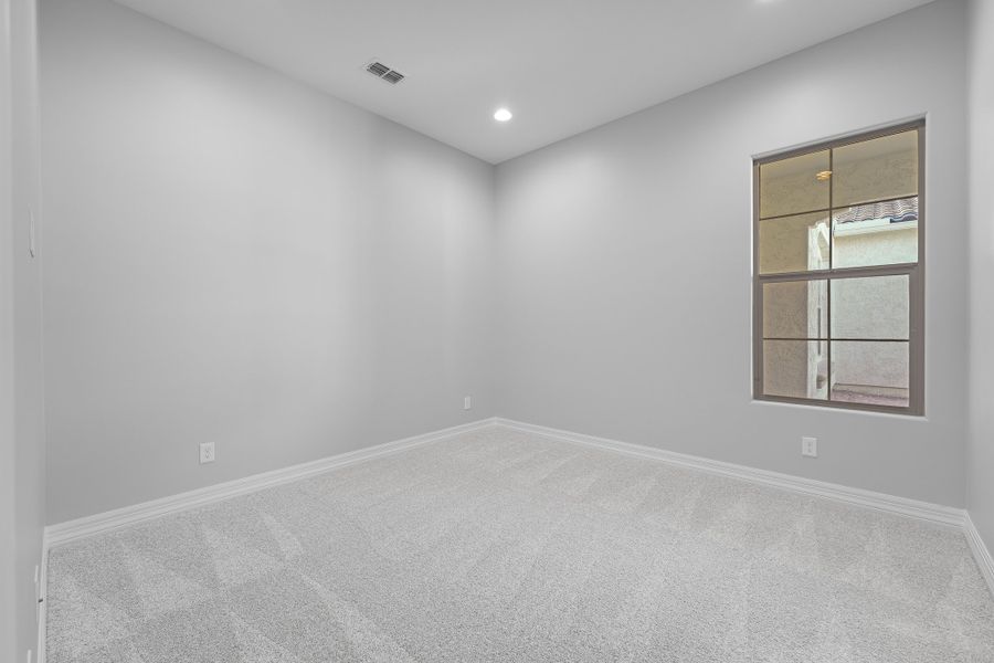 Spacious, unfurnished interior of a new home in Ellsworth Ranch Capstone Collection, Queen Creek (Image 43).