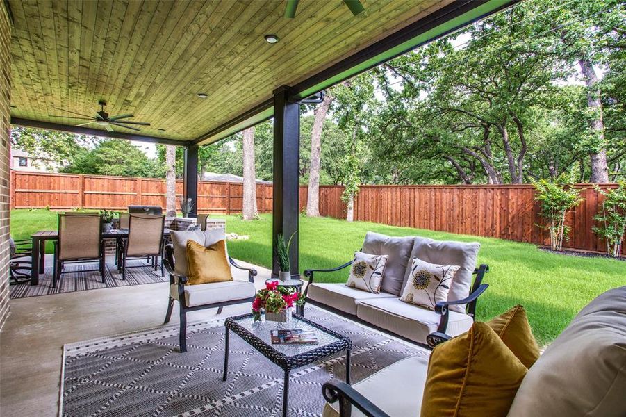 View of patio / terrace featuring an outdoor living space and ceiling fan