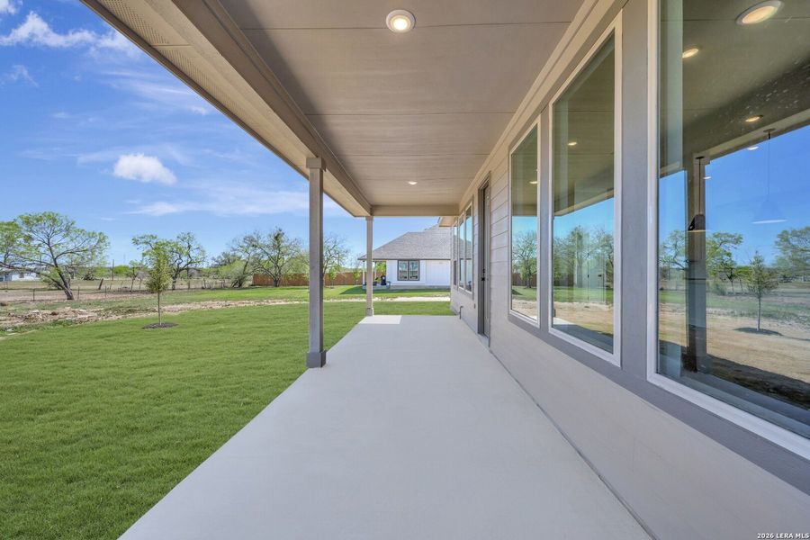 Exterior details and patio area of a home in Preserve at Annabelle Ranch, San Antonio (Image 3).