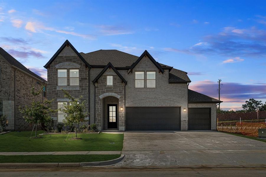 Front exterior of a new home in Mockingbird Hills 60-65, Joshua, TX, highlighting curb appeal (Image 2).