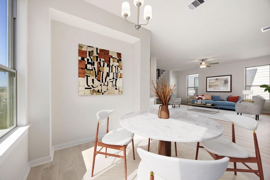 The inviting dining area is accentuated by a striking architectural niche, perfectly designed to showcase artwork or a functional dining hutch! *Virtually Staged The inviting dining area is accentuated by a striking architectural niche, perfectly designed to showcase artwork or a functional dining hutch! *Virtually Staged