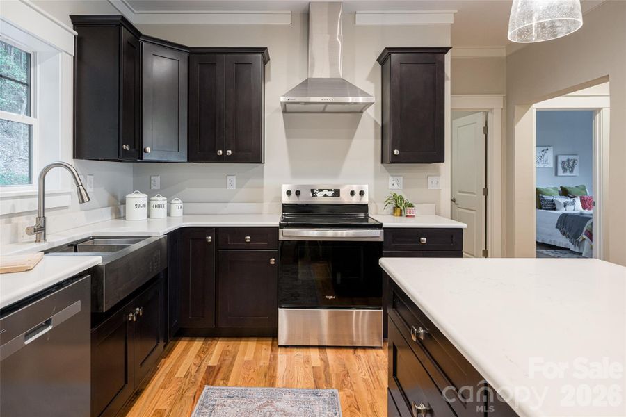 Sparkling Kitchen Features Beautiful Countertops and Stainless Stee