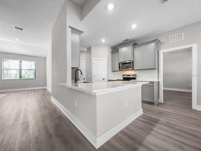 Furnished interior view inside a new home in , Port Charlotte (Image 6).