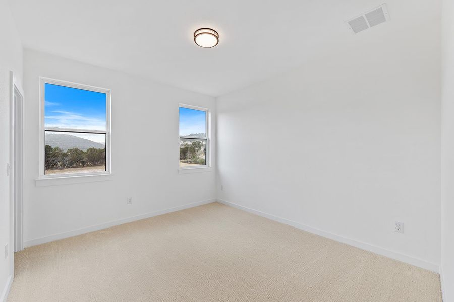 Spacious, unfurnished interior of a new home in Rough Hollow The District, Lakeway (Image 15).