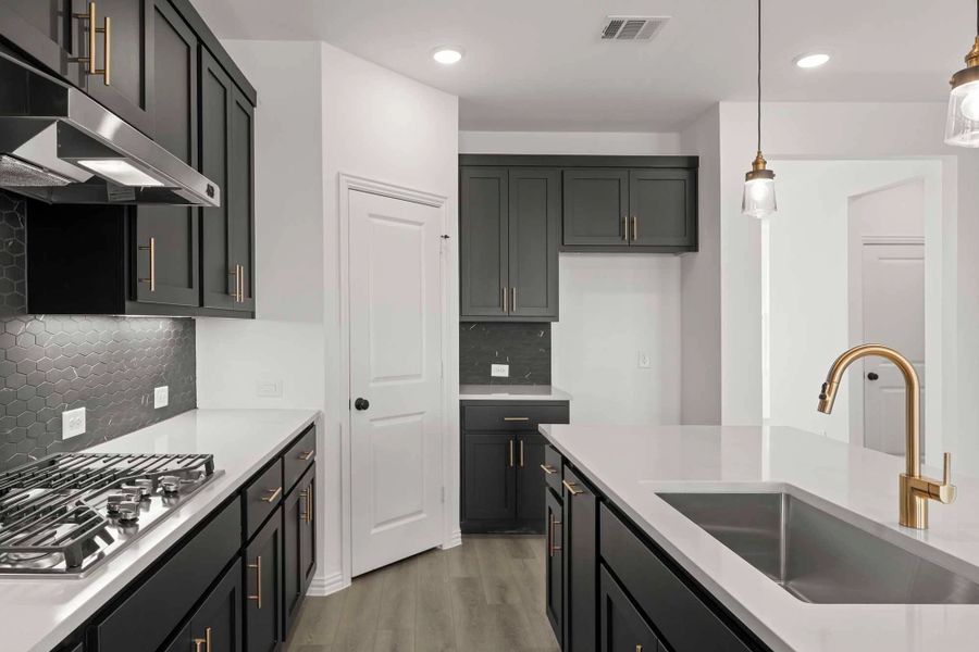 Kitchen featuring the Noir Collection Kitchen featuring the Noir Collection