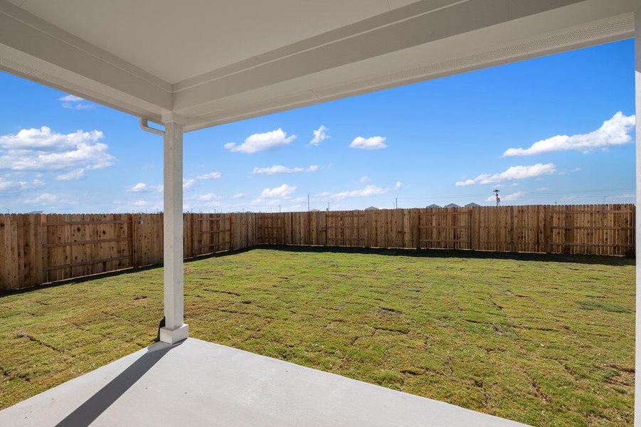 Exterior details and patio area of a home in Willow Springs, Buda (Image 24).