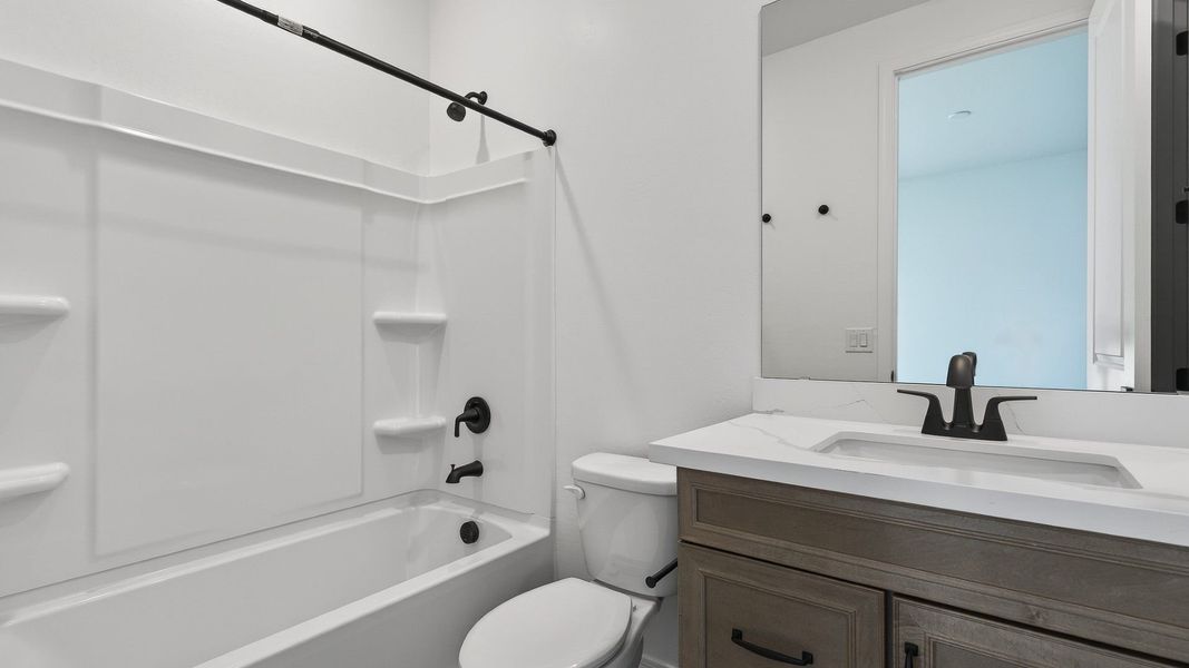 Furnished interior view inside a new home in The Grove at El Cidro, Goodyear (Image 10).