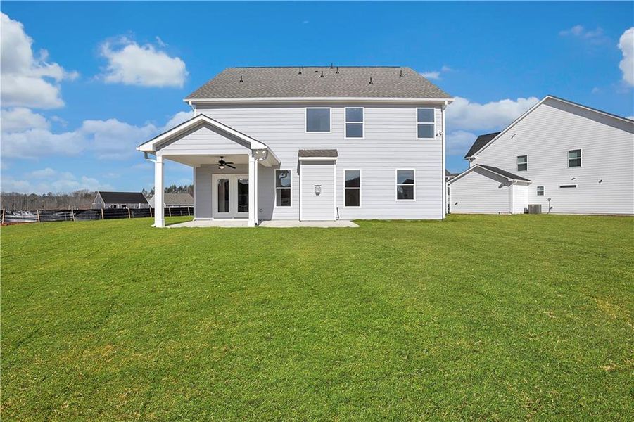 Exterior details and patio area of a home in Twin Lakes, Hoschton (Image 32).