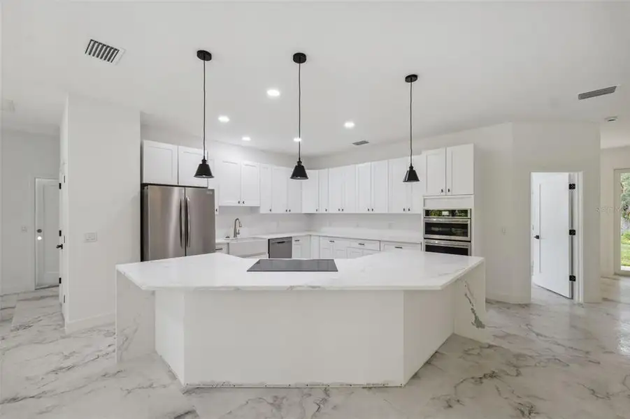 Furnished interior view inside a new home in , Brooksville (Image 9).