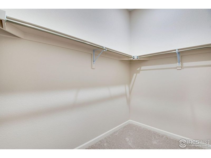 Spacious, unfurnished interior of a new home in Westside Crossing, Berthoud (Image 31).