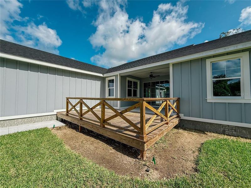Front exterior of a new home in , Lake Helen, FL, highlighting curb appeal (Image 33). Front exterior of a new home in , Lake Helen, FL, highlighting curb appeal (Image 33).
