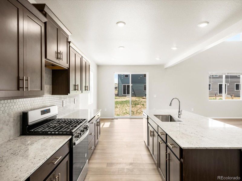 Furnished interior view inside a new home in Poudre Heights: The Alpine Collection, Windsor (Image 12).