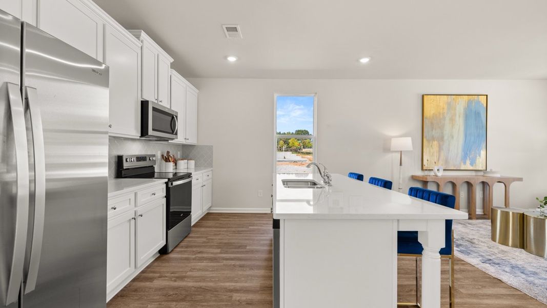 Representative furnished interior of a home built from the Iria Glen by D.R. Horton in Brookland Commons, Monroe (Image 10).