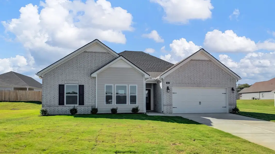 Front exterior of a new home in Riverwood Gardens, Oakland, TN, highlighting curb appeal (Image 2).