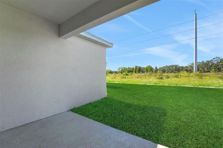 Exterior details and patio area of a home in Willowbrook North, Winter Haven (Image 18).