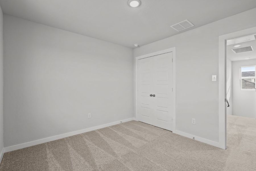 A room with white doors.