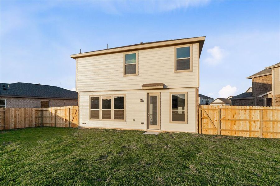 Come and see this spacious backyard on a large cul-de-sac lot. There is plenty of room for the kids to play and adults to relax!