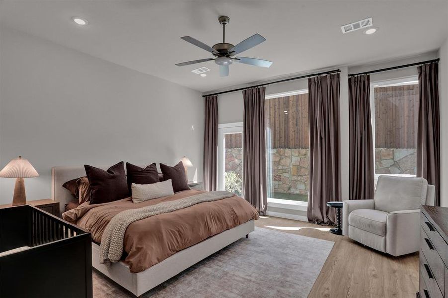 The first-floor primary retreat offers a calm, boutique-hotel feel with warm natural light, soft textures, and a spacious layout designed for true unwinding. The first-floor primary retreat offers a calm, boutique-hotel feel with warm natural light, soft textures, and a spacious layout designed for true unwinding.