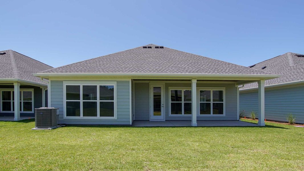Front exterior of a new home in Breakfast Point East Phase I, Panama City Beach, FL, highlighting curb appeal (Image 23).