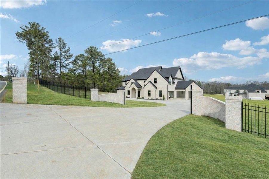 Front exterior of a new home in , Buford, GA, highlighting curb appeal (Image 15).