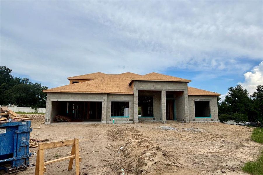 Front exterior of a new home in Wolf Lake Ranch, Apopka, FL, highlighting curb appeal (Image 2).