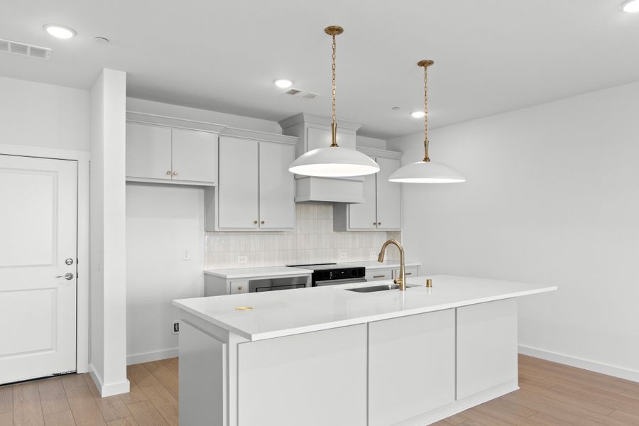 Furnished interior view inside a new home in Wildridge, Oak Point (Image 5).