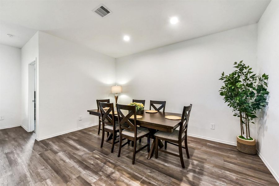 Furnished interior view inside a new home in Sunterra, Katy (Image 7).