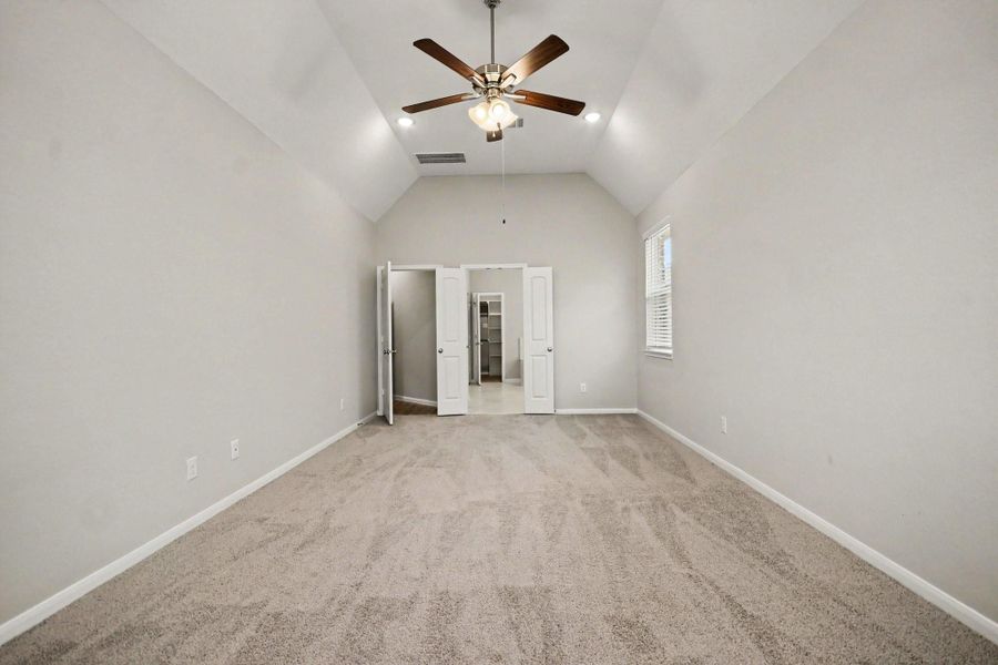 Another view of the primary bedroom