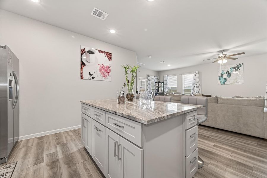 Furnished interior view inside a new home in Sunterra, Katy (Image 30).