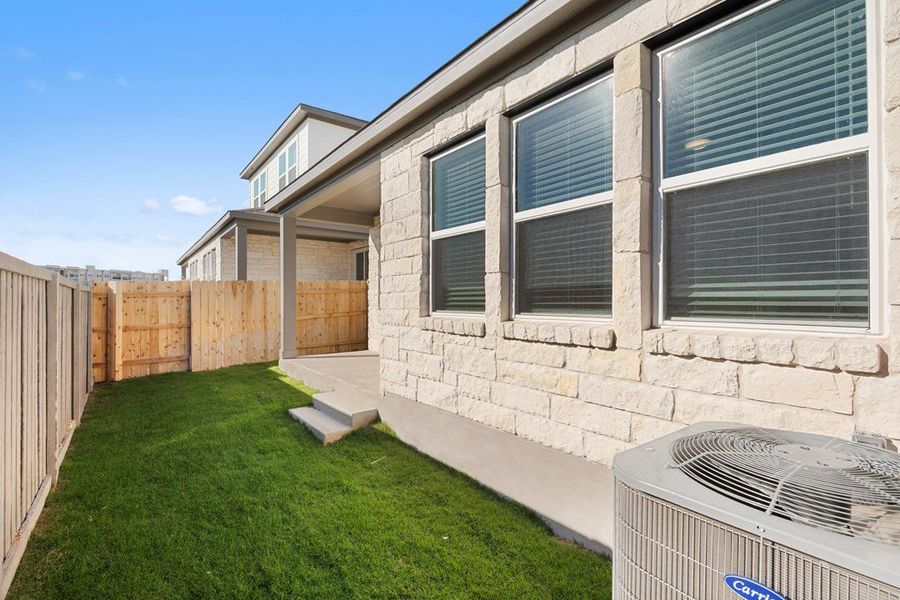 Exterior details and patio area of a home in Park Central, Georgetown (Image 26).