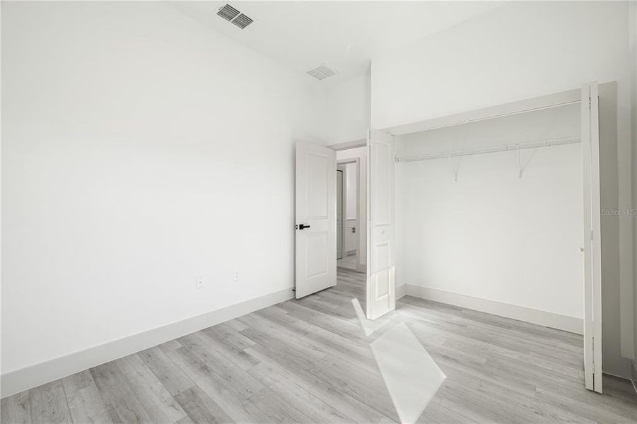 Spacious, unfurnished interior of a new home in , Port Charlotte (Image 41).