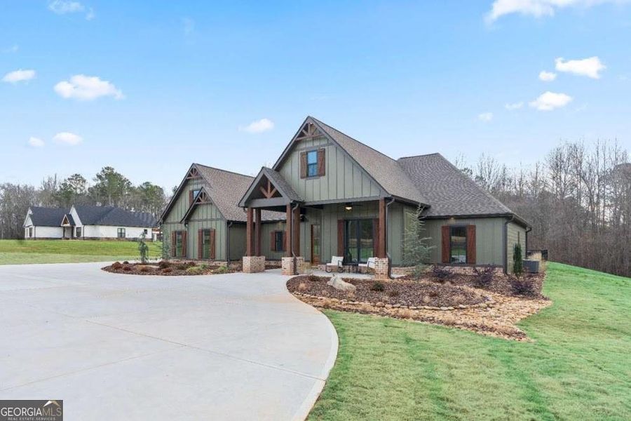 Front exterior of a new home in , Roopville, GA, highlighting curb appeal (Image 2). Front exterior of a new home in , Roopville, GA, highlighting curb appeal (Image 2).
