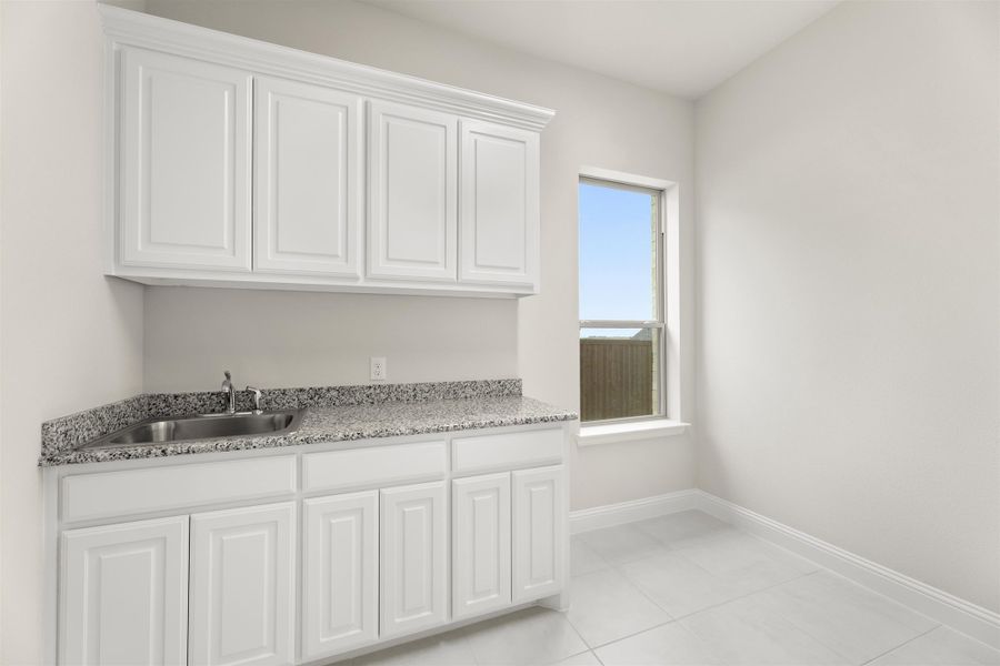 Representative furnished interior of a home built from the Brentwood by Windsor Homes in Nelson Lake Estates, Rockwall (Image 14).