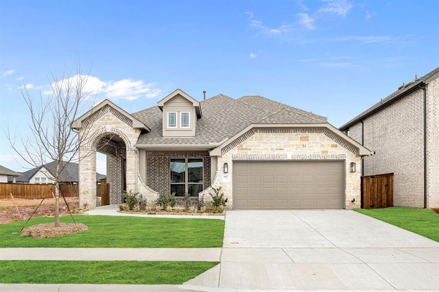 Front exterior of a new home in Waterscape, Royse City, TX, highlighting curb appeal (Image 1). Front exterior of a new home in Waterscape, Royse City, TX, highlighting curb appeal (Image 1).