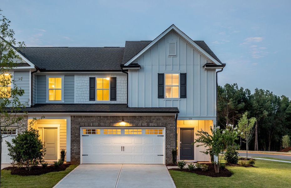 Front exterior of a new home in Exchange at 401, Raleigh, NC, highlighting curb appeal (Image 19).
