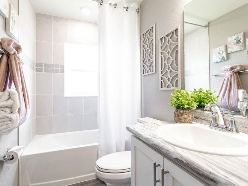 Secondary bedrooms share a convenient hall bath - Parsyn by Highland Homes