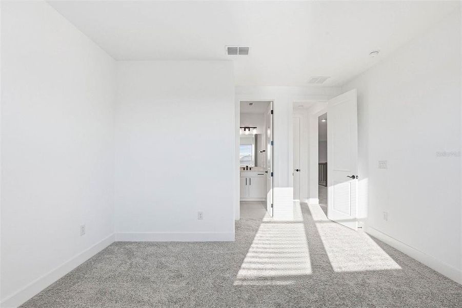 Spacious, unfurnished interior of a new home in Vida's Way, Wesley Chapel (Image 63).