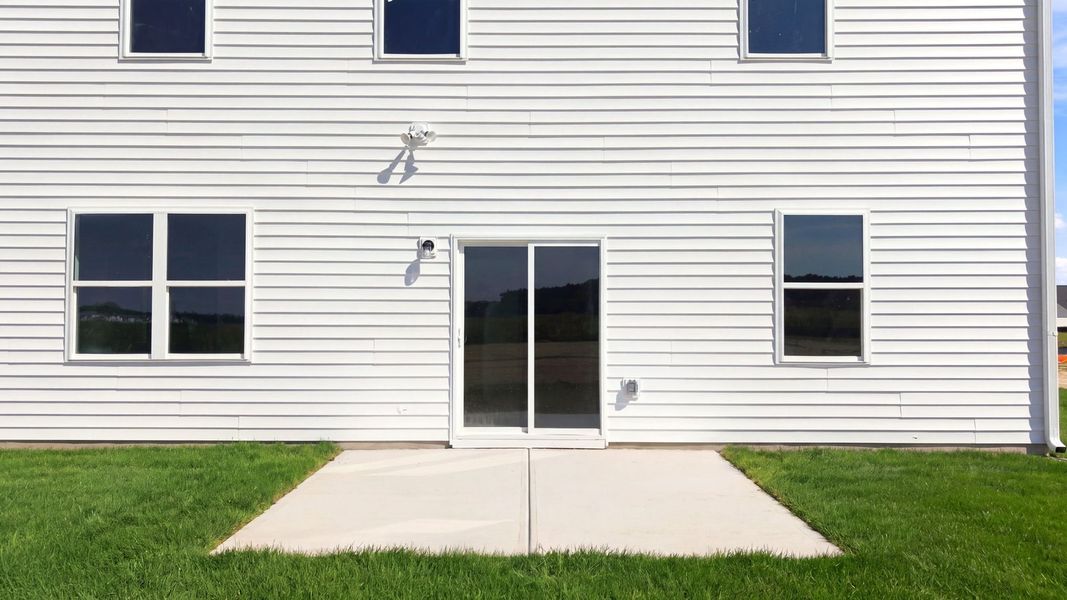 Exterior details and patio area of a home in East Ridge, Ayden (Image 21).