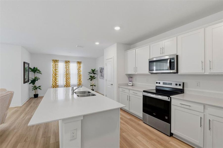Furnished interior view inside a new home in Oakfield Lakes, Parrish (Image 7).