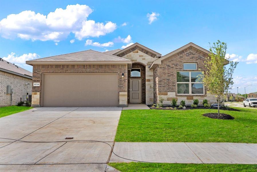 Front exterior of a new home in Terra Trace, Fort Worth, TX, highlighting curb appeal (Image 2). Front exterior of a new home in Terra Trace, Fort Worth, TX, highlighting curb appeal (Image 2).